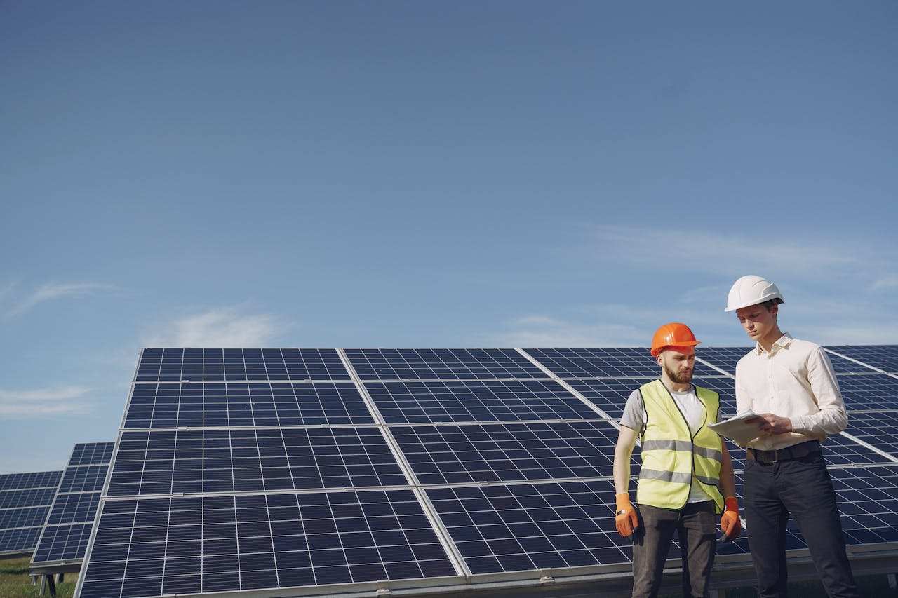 Electricians Inspecting the Solar Panels